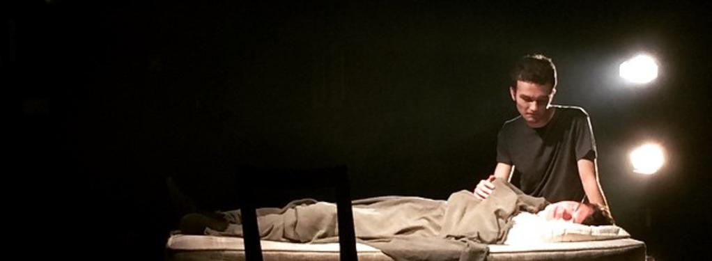 Photograph from The Pillowman - lighting design by Hayden Borgars