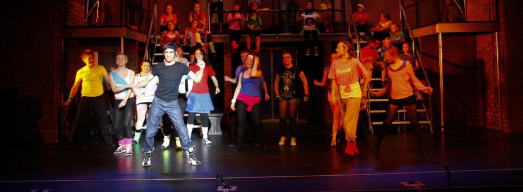 Photograph from Fame The Musical - lighting design by Peter Vincent