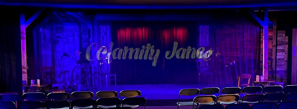 Photograph from Calamity Jane The Musical - lighting design by mcleand