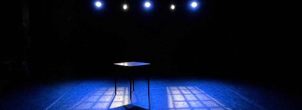 Photograph from Prima Facie (Extract) - lighting design by Toby Ison