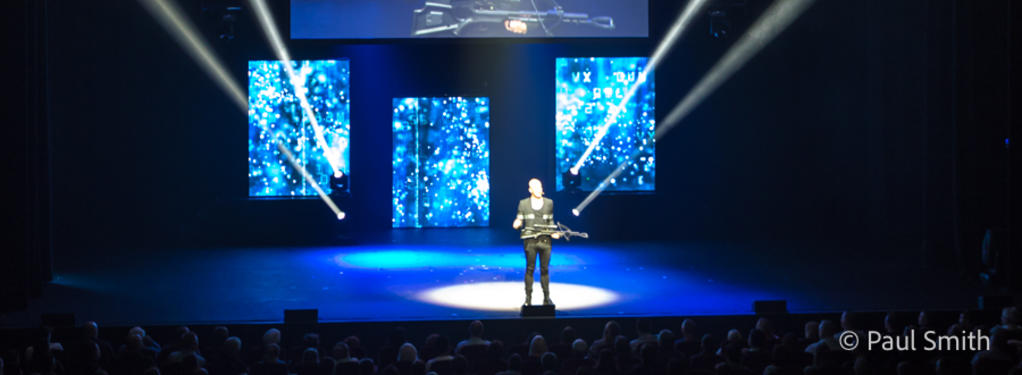 Photograph from Illusionists: Direct from Broadway - lighting design by Paul Smith