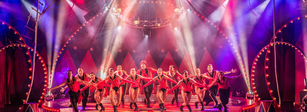 Photograph from Mr Tickertons Clockwork Circus - lighting design by Archer