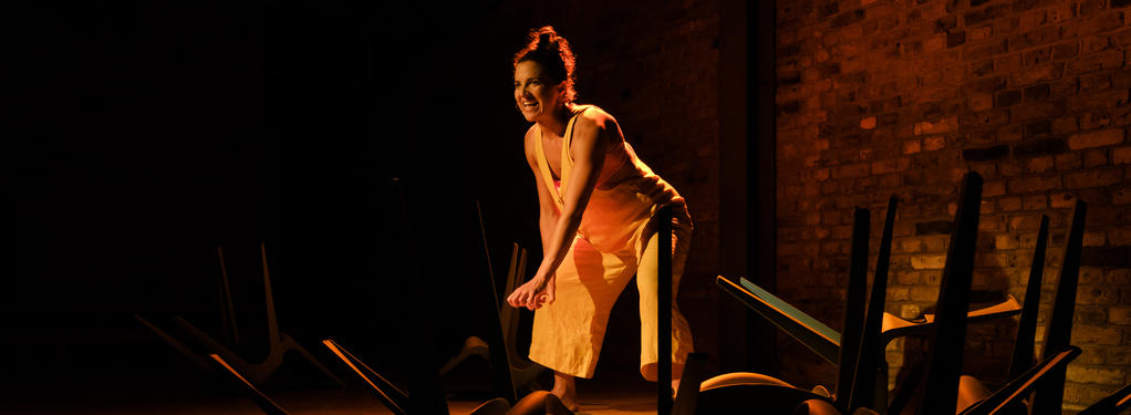 Photograph from 100 Years - lighting design by Claire Childs