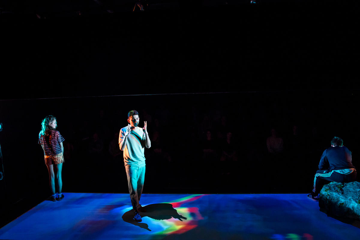 Photograph from Natives - lighting design by Zoe Spurr