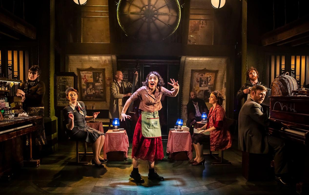 Photograph from Amélie - lighting design by Elliot Griggs