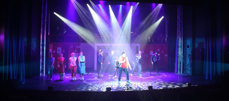 Photograph from Grease - lighting design by Seb Blaber