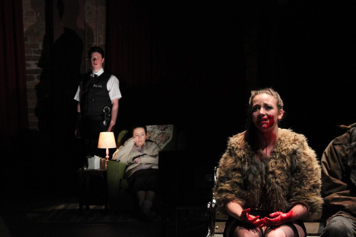 Photograph from The Strangeness of Others - lighting design by George Leigh