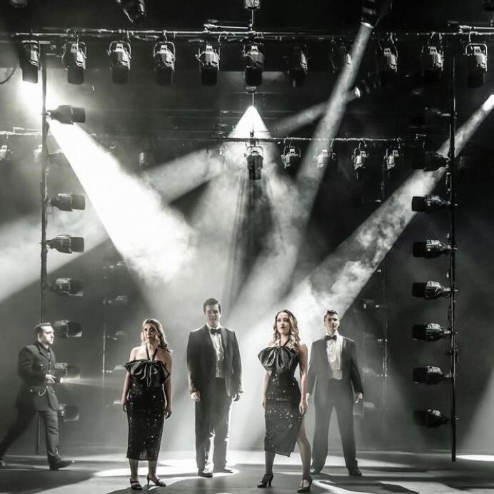 Photograph from Cy Baby - lighting design by Charlie Morgan Jones