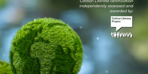 small poster witih PLASA logo and picture of green hedge and green globe