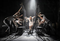 Photograph from The Beautiful Game - lighting design by Christopher Mould