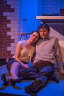 Photograph from Stitched Up - lighting design by James McFetridge