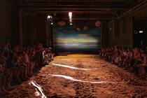Photograph from SAUL NASH SS23 - lighting design by Edward Saunders