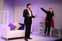 Photograph from Rumours - lighting design by Peter Vincent