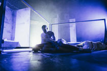 Photograph from NOT ABOUT NIGHTINGALES - lighting design by Sam Ohlsson