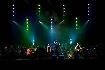 Photograph from Dave Dobbyn with the CSO - lighting design by Brendan Albrey