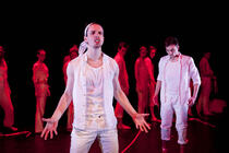 Photograph from All Day Permanent Red - lighting design by Chloe Kenward