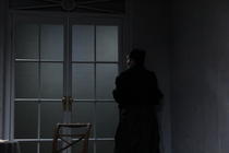 Photograph from Ghosts - lighting design by Alastair Griffith