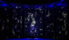 Photograph from Stephen Fry - Mythos Tour, A Trilogy Of A Shows - lighting design by Archer
