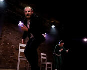Photograph from Vermin - lighting design by Alex Lewer