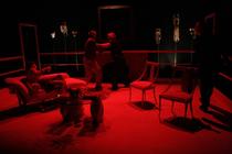 Photograph from God of Carnage - lighting design by Peter Vincent